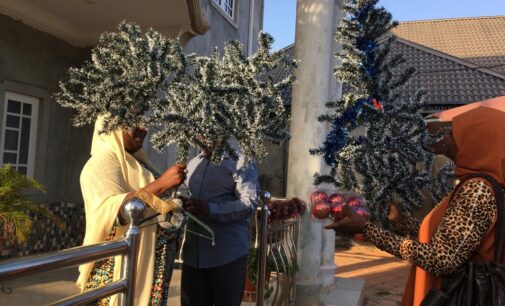 EXTRA: Muslim decorates reverend’s house with Christmas tree in Kaduna