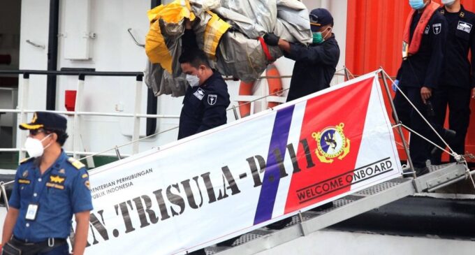 Missing Indonesian plane: Black boxes, human body parts found
