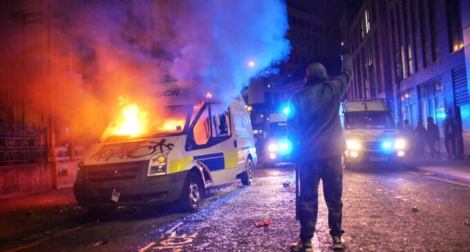 Officers attacked, vehicles razed as UK protest against police bill turns violent