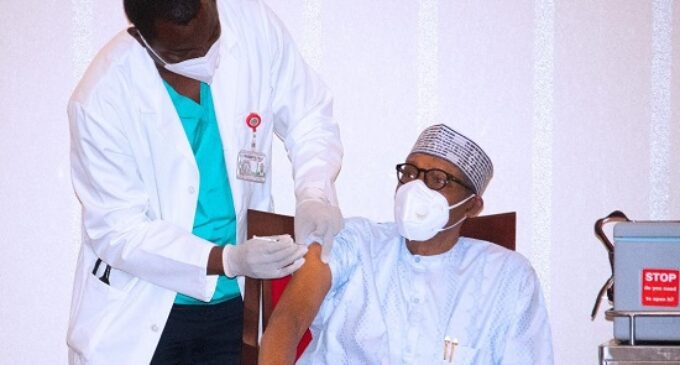 Why did Buhari take his own COVID-19 vaccine on the right arm?