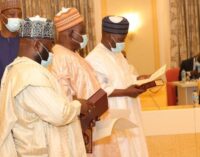 Buhari swears in three INEC commissioners