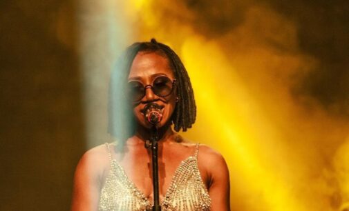 WATCH: Asa sings ‘there’s fire on the mountain’ as Buhari unveils NNPC Limited