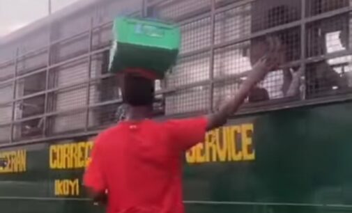 VIDEO: Lagos hawker goes viral for giving money to inmates