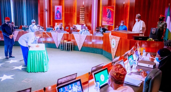 Buhari swears in six INEC commissioners