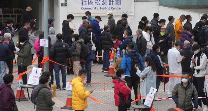 Hong Kong hospitals ‘overwhelmed’ in fresh COVID surge