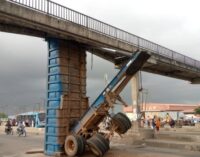 Shock as truck gets stuck under Lagos pedestrian bridge