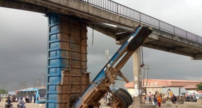 Shock as truck gets stuck under Lagos pedestrian bridge