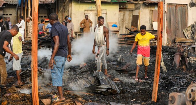 PHOTOS: Property destroyed as fire guts Lagos plank market