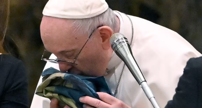 Pope Francis condemns ‘horrendous cruelty’ in Bucha as he kisses battered Ukrainian flag