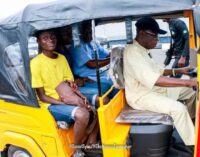 PHOTOS: Obasanjo turns ‘tricycle rider’, picks up passengers in Abeokuta