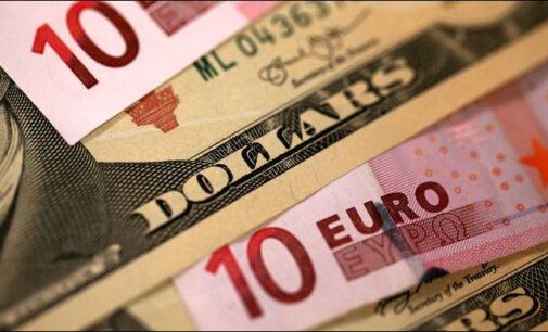 Euro slides to 20-year low, nears parity with dollar