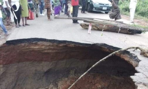 Commuters stranded as portion of major access road in Ekiti caves in