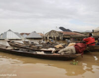 CAUGHT UNAWARES: Their homes were submerged by flood. Now they sleep on water