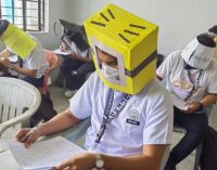 EXTRA: Philippines students wear ‘anti-cheating’ hats during exam