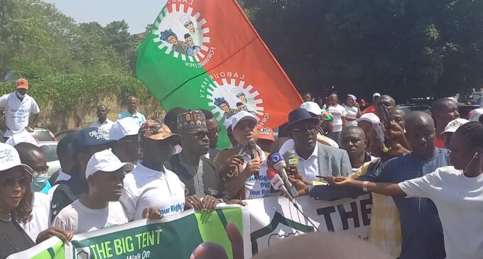 PHOTOS: Pat Utomi’s group storms INEC HQ, demands PVC distribution to voters