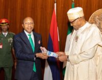 Buhari unveils redesigned naira notes