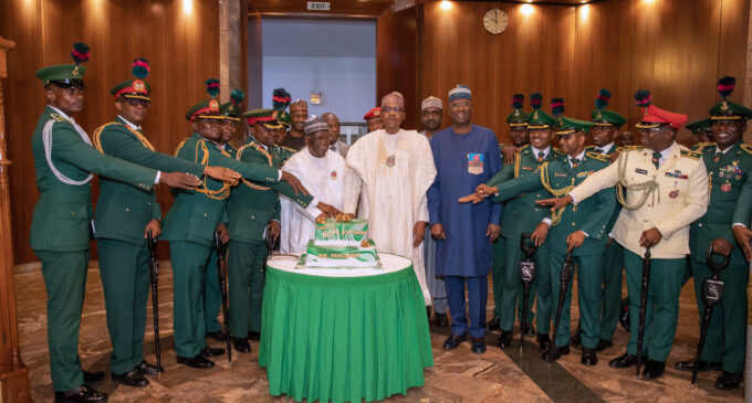 PHOTOS: State House staff, guards brigade celebrate Buhari at 80