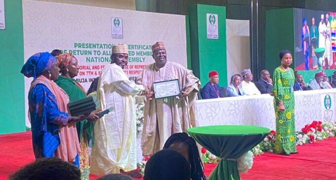 PHOTOS: INEC presents certificates of return to reps-elect