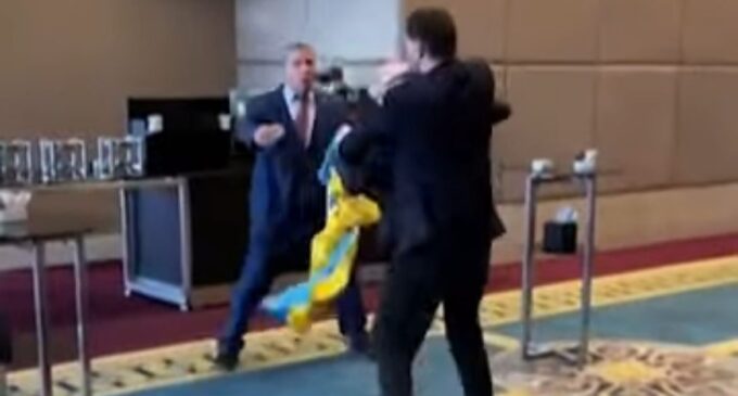 Russia, Ukraine delegates wrestle over flag-snatching at Turkey summit