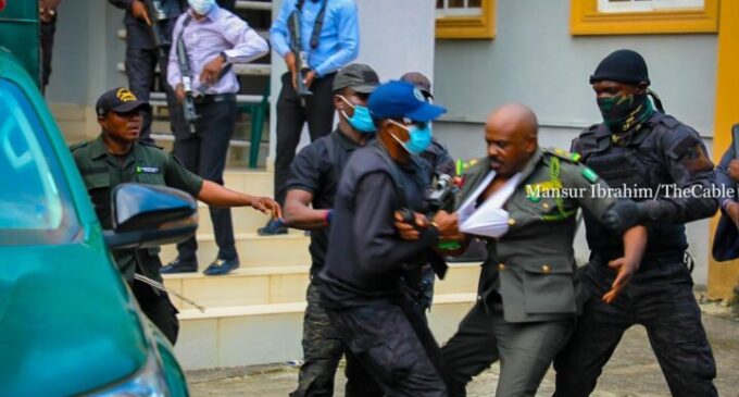 PHOTOS: DSS officers, prison officials fight over custody of Emefiele