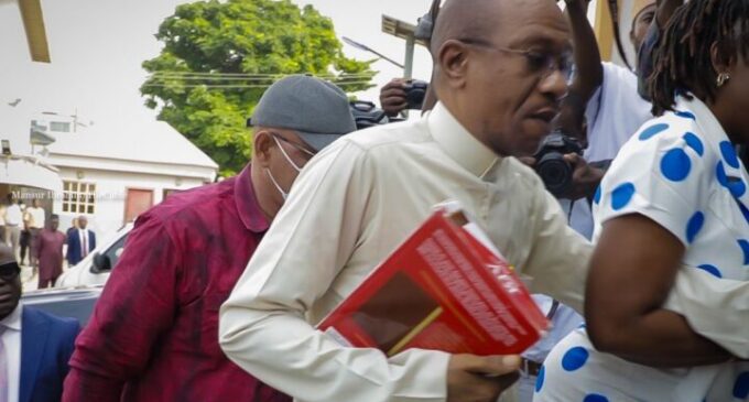 PHOTOS: Emefiele arrives court with Bible