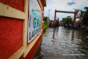 building half-submersed in water in Lagos