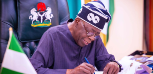 Tinubu signs bill to reintroduce old national anthem into law