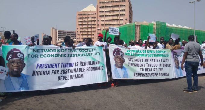 PHOTOS: ‘Nigeria will soon get better’ – pro-Tinubu protesters demonstrate in Abuja