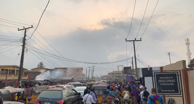 PHOTOS: Students, workers stranded after explosion in Lagos community