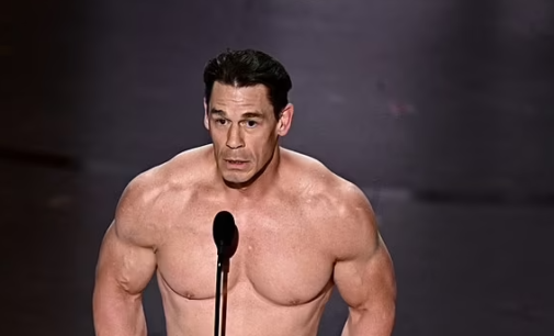 EXTRA: John Cena appears nude on Oscars stage
