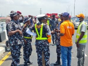 Police officers at the scene of crash on third mainland bridge
