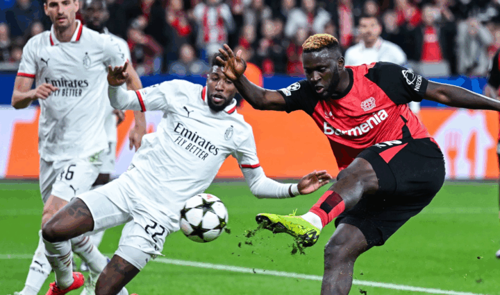 Victor Boniface (right) scores his first-ever UEFA Champions League goal against AC Milan
