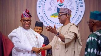 Godswill Akpabio, president of the senate, and Tajudeen Abbas, speaker of the house of representatives, exchange pleasantries during the 2025 budget presentation at the national assembly