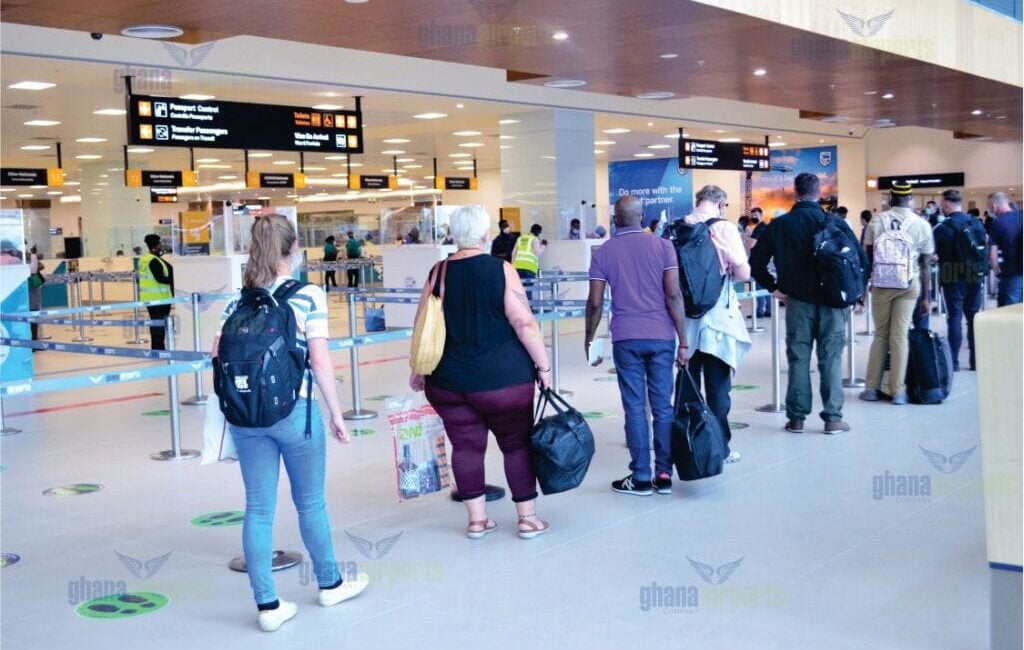 travelers at an airport in Ghana