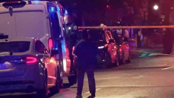Law enforcement on the scene after two staff members of the Israeli embassy in Washington were shot and killed outside the Capital Jewish Museum in Washington | Photo: WJLA via AP