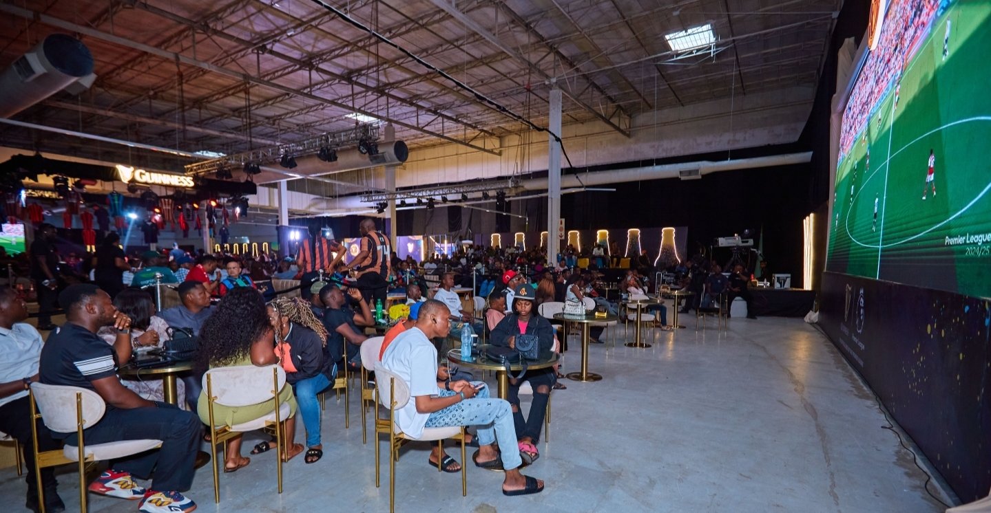 Audience viewing the Arsenal - Newcastle match at Lagos Guinness matchday