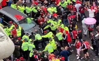 Authorities at the scene where a car drove into crowd at Liverpool victory parade