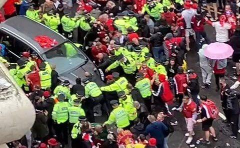 Authorities at the scene where a car drove into crowd at Liverpool victory parade