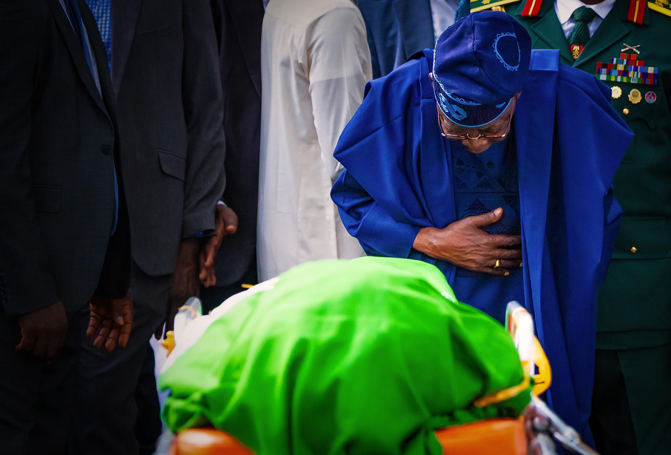 PHOTOS: Tinubu bows before Buhari's remains as he's laid to rest in Daura | TheCable