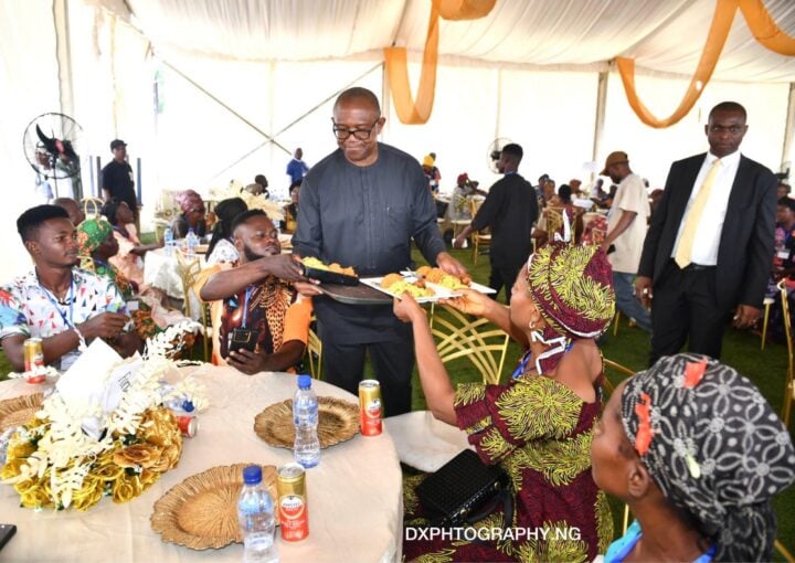 Peter Obi serving guests