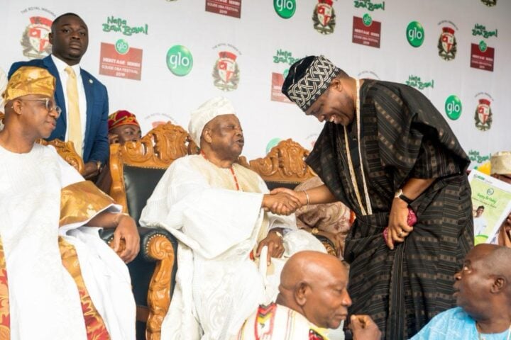 Bimbo Ashiru, chairman of Oodua Group (right), exchanging a handshake with the late Awujale of Ijebuland