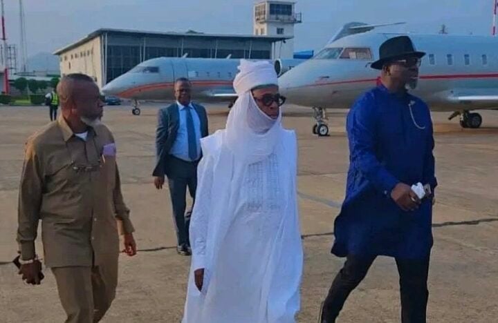 Amaechi adorns turban at Buhari's burial