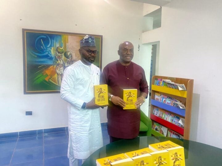 L-R: Ismail Omipidan, author of Persona Non Grata, with Chris Ezike, chief of staff to Emeka Offor