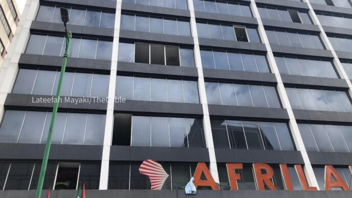 Broken windows seen at Afriland Towers after the fire incident