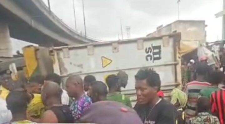 container-laden truck crushes tricycle in ijora, Lagos