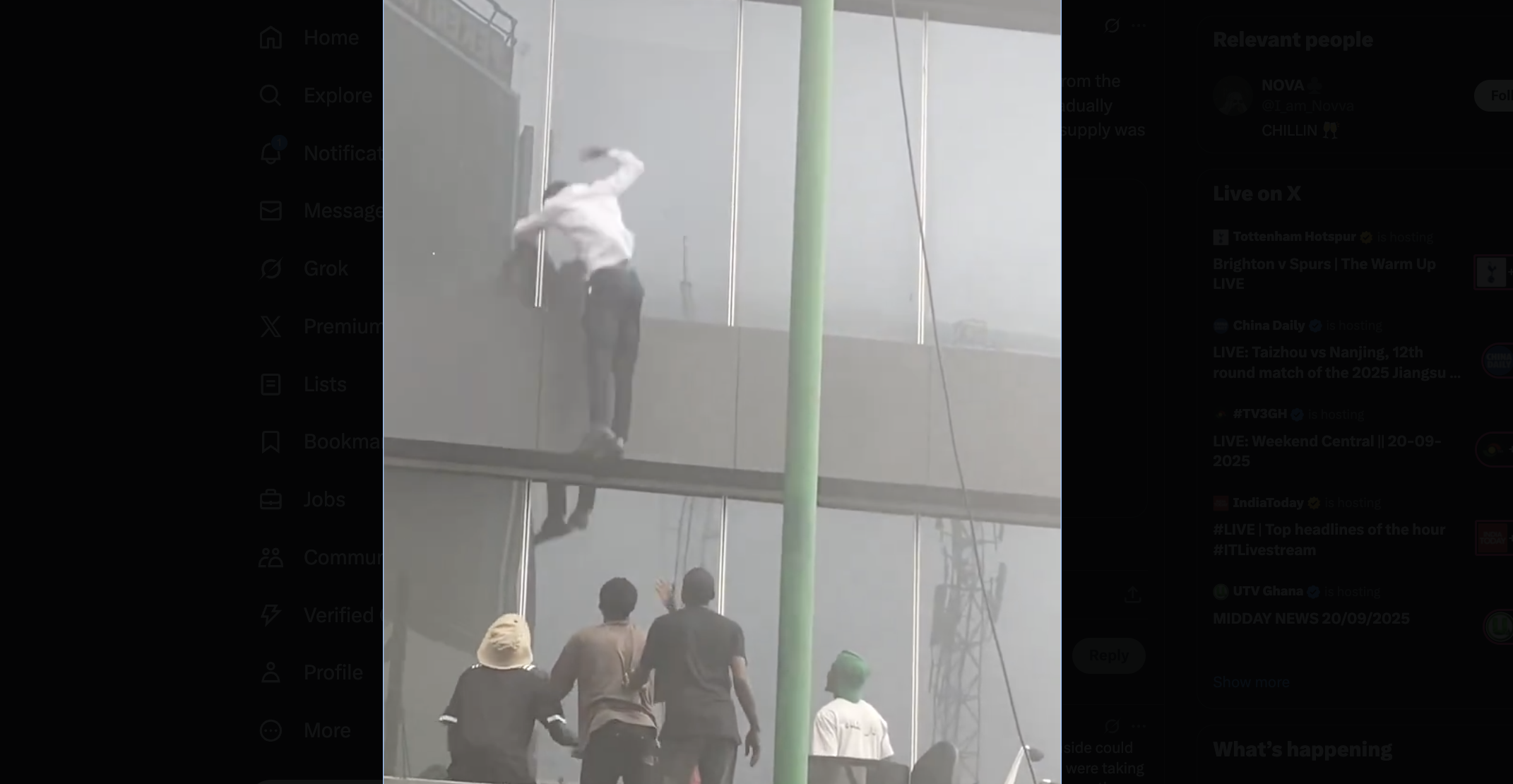 Screenshot from trending video showing a worker jumping from the window. He was among one of the survivors