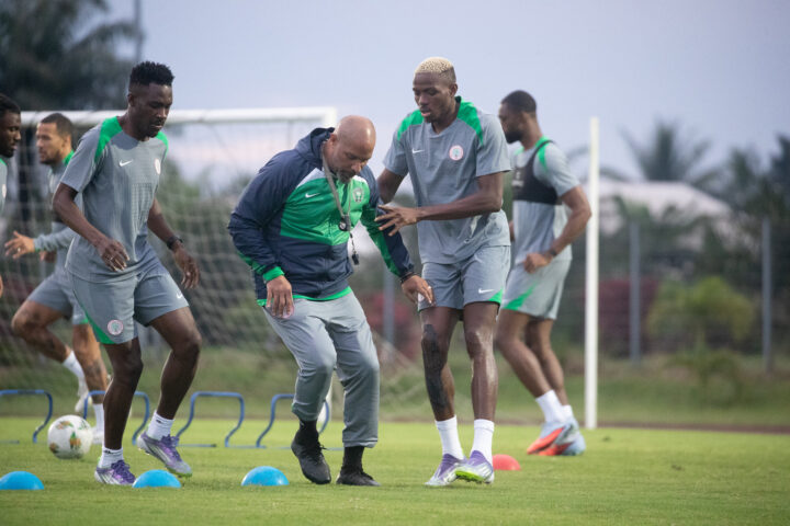 Eric Chelle (centre) leading the Super Eagles' training