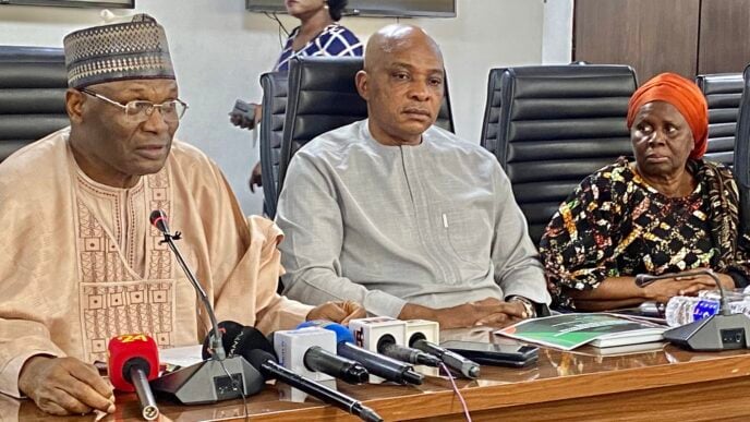 Mahmood Yakubu, the INEC chairman (left)