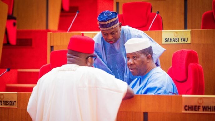 Mohammed Dandutse (blue cap) during senate plenary | File photo