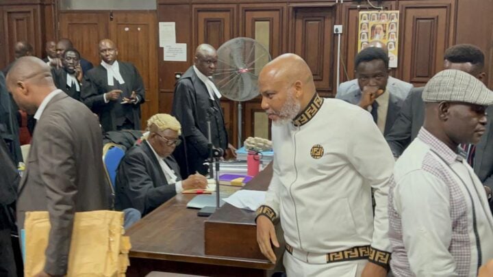 Nnamdi Kanu (in trademark white turtle neck shirt) in court